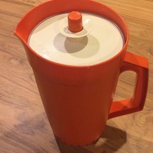 Tupperware pitcher. Orange and cream.